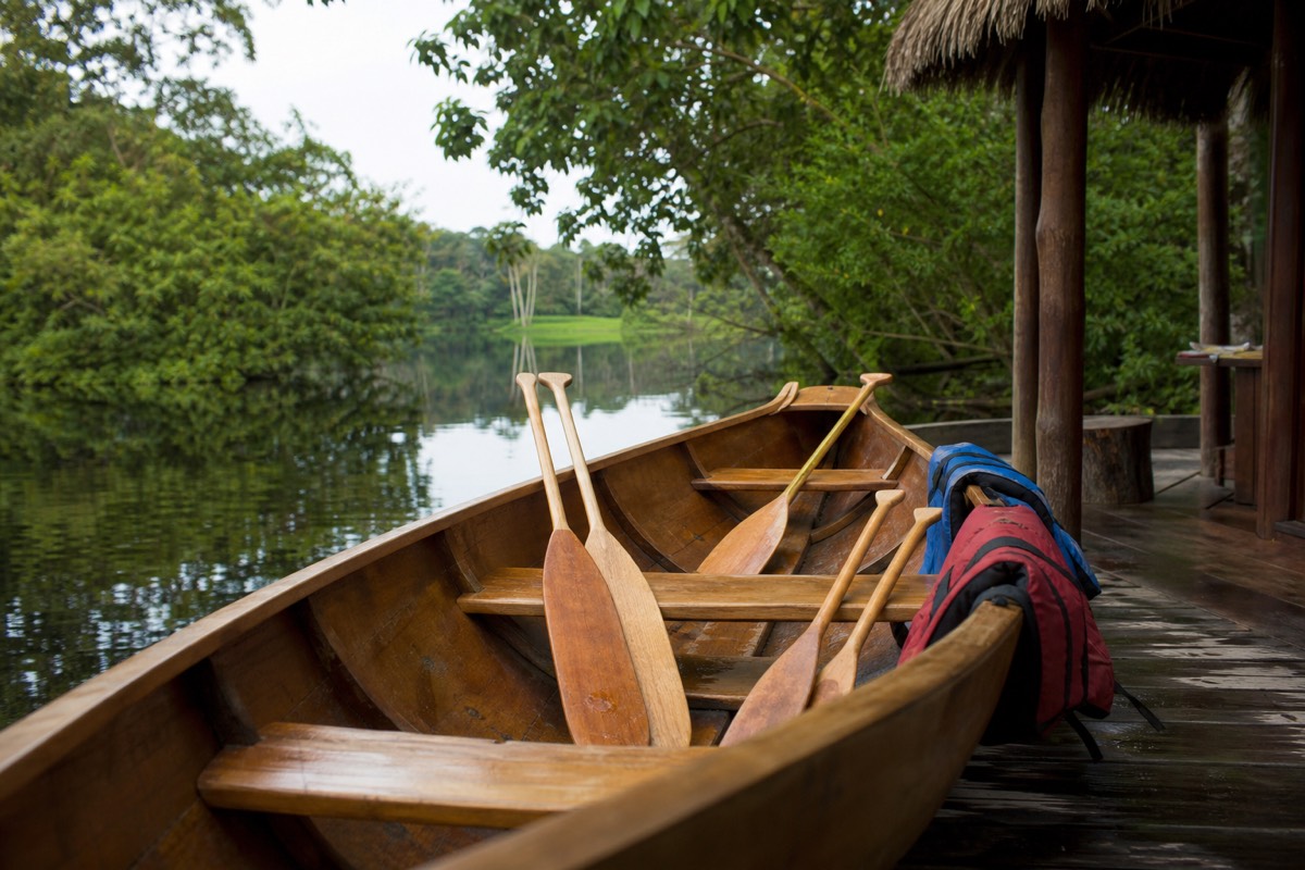 A family on a guided Amazon canoe outing